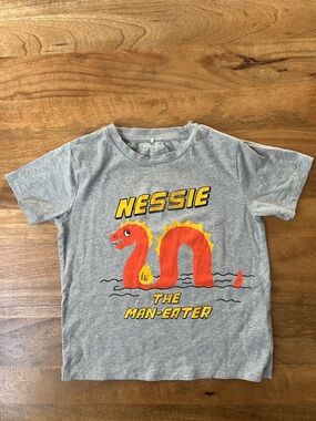 Mini Rodini Grey Tee with Orange & Yellow Nessie “The Man Eater” Graphic